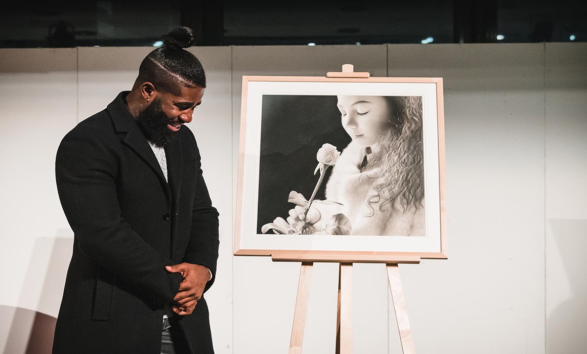 Award winning artist Kelvin Okafor gifts portrait to Middlesex University | Middlesex University London